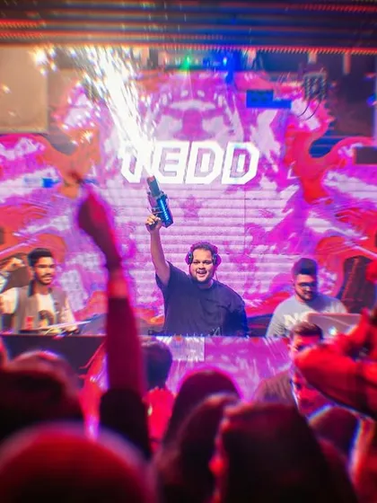 When I'm on the decks, I bring the full show. This is me with a CO2 cannon, creating pure mayhem and ensuring the energy on the dance floor is explosive.