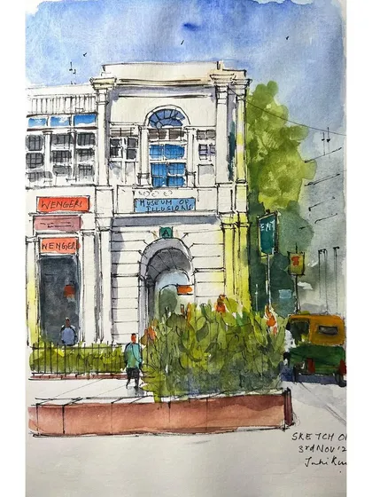 A watercolor sketch of the iconic Wenger's building in Connaught Place, done with the Urban Sketchers Delhi group. I've sketched this place many times, and each time I find a new perspective.
