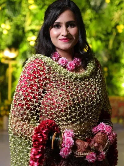 The bride looks radiant, wrapped in the floral dupatta. The combination of fresh flowers adds a beautiful fragrance and a unique sensory experience to her celebration.