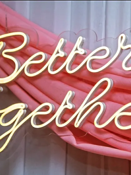 It's all about the personal touches. A custom neon sign like this "Better Together" one adds a modern, warm glow and a perfectly Instagrammable element to any engagement or anniversary decor.