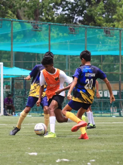 Teamwork in action as our players press the opposition to win back the ball.