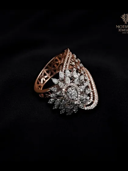 A still image of the magnificent leaf-inspired diamond ring, highlighting the detailed craftsmanship and floral silhouette.