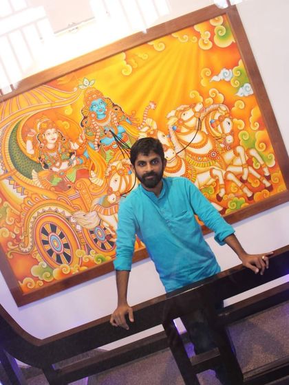 Standing with my 'Geethopadesham' mural on canvas. This piece is inspired by the ancient temple art of Kerala and brings that sacred feeling into the home.
