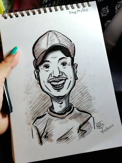 This caricature of a smiling man in a cap was a special request. It's an honor to draw people's loved ones.