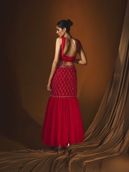 The back view of the Selina set from Label Japji Arora, highlighting the design's deep-back blouse and embroidered skirt.