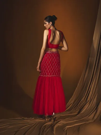 The back view of the Selina set from Label Japji Arora, highlighting the design's deep-back blouse and embroidered skirt.
