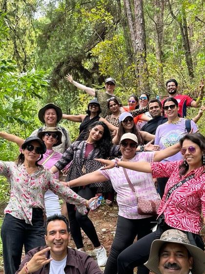 Our happy group posing together during the trek through the forests on our way to Namo Buddha Monastery. The path itself is as much a part of the spiritual journey as the destination.