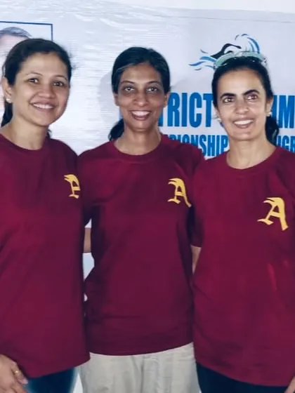 The smiles of our proud parents after a successful competition. Their support and commitment are invaluable to the success of my swimmers.