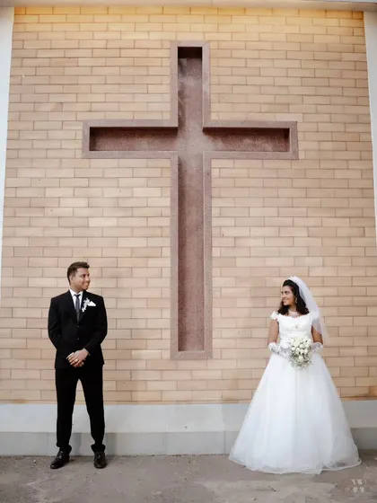 A powerful and symbolic moment from a Christian wedding in Mumbai. The bride and groom stand before the cross, marking the beginning of their journey in faith and love. This shot shows my approach to capturing the sanctity of the ceremony.