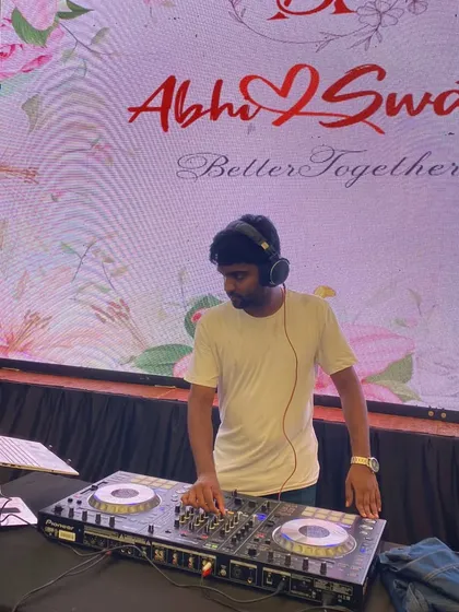 A personalized LED screen with the couple's name adds a classy touch to the DJ setup. This was for Abhi and Swathi's beautiful wedding reception.