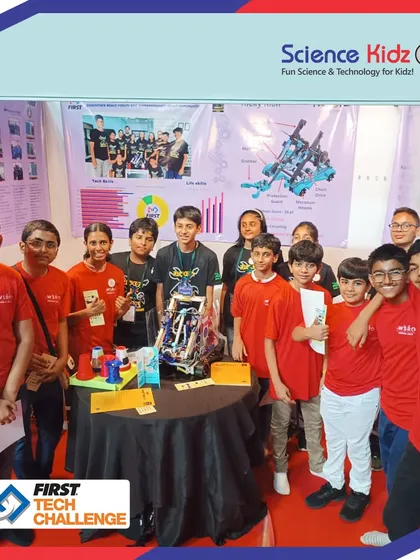 The full team with their FIRST Tech Challenge project. This display represents weeks of hard work, collaboration, and innovative thinking on creating a sustainable future city.