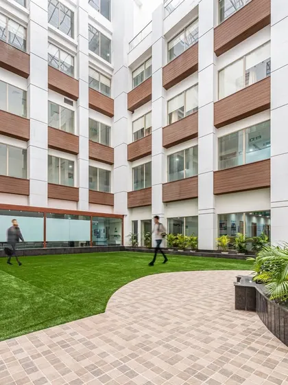 Another view of the courtyard at Sarvesh Health City, showing how we use landscaping and open space to create community interaction and break from the regulated layouts of hospital interiors.