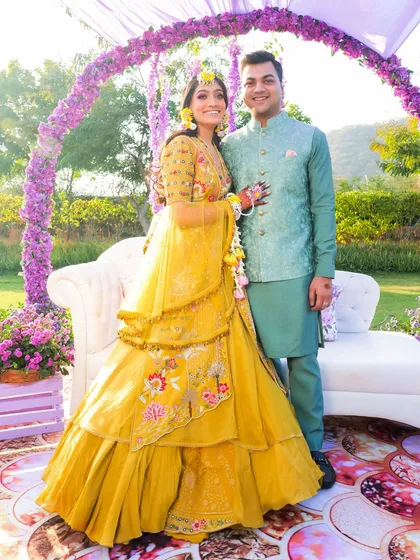 The Haldi ceremony is all about vibrant color and pure joy. We capture the uninhibited laughter and candid interactions, preserving the energy of this fun-filled tradition. This image highlights our focus on capturing genuine emotions and the bright palette of Indian weddings.