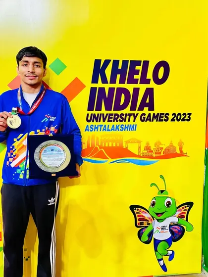 The result of dedication. Our boxer, Krishan Thakran, proudly displays his Gold Medal and plaque after winning the Khelo India University Games 2023.