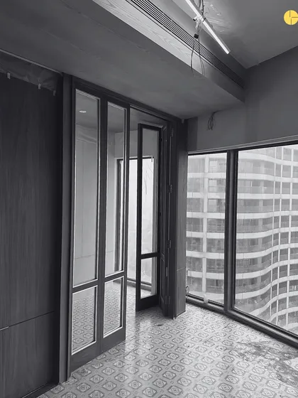 An excerpt of details from our upcoming 58WV project. This black and white photo highlights the textures of the patterned floor tiles and the clean lines of the window frames against the city backdrop.