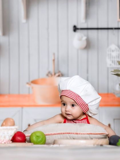 My heart just got a little bigger. A sweet portrait of our little chef in the kitchen studio.