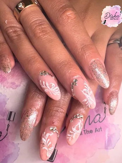 A chic and classy design with glitter, white patterns, and delicate rhinestone accents.