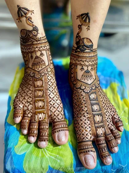 Another perspective of the unique elephant and peacock foot design, highlighting the creativity and storytelling in the artwork.
