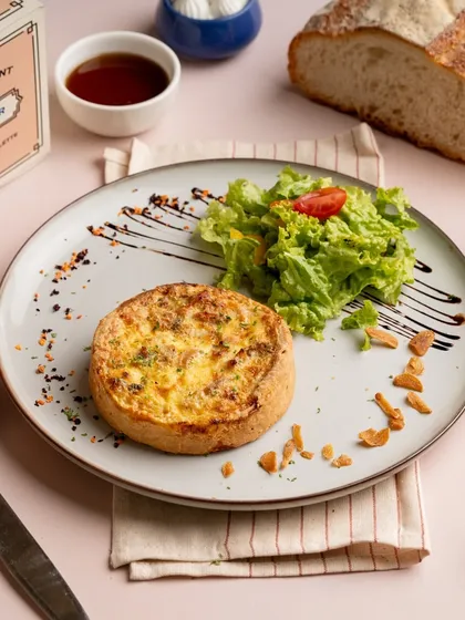 Another look at my popular Chicken & Mushroom Quiche, plated beautifully with a side salad. The golden-brown crust promises a delicious, buttery bite.