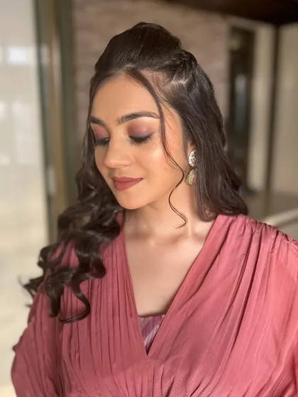 A close-up showing the soft, blended eyeshadow and defined brows.