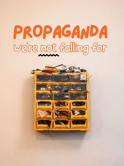 This image of a drawer full of parts is a symbol of the "propaganda" we're not falling for. We reject the idea that things need to be neat and perfect. Mess is a sign of creativity in progress.