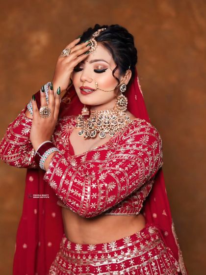 A close-up that captures the essence of bridal joy. The focus is on luminous skin and eyes that sparkle with happiness.