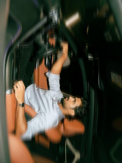 An abstract, motion-blur shot inside a car. This artistic technique conveys a sense of speed and dynamism, creating a visually exciting and unconventional image.