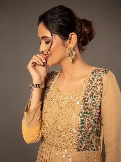 A candid, smiling shot for an ethnic wear brand. The soft lighting and natural expression make the product feel very wearable.