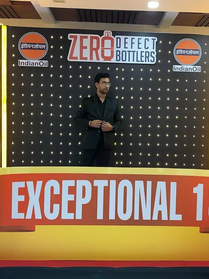 On the grand stage for an IndianOil "Zero Defect Bottlers" event. The stage design adds to the impact of the performance.