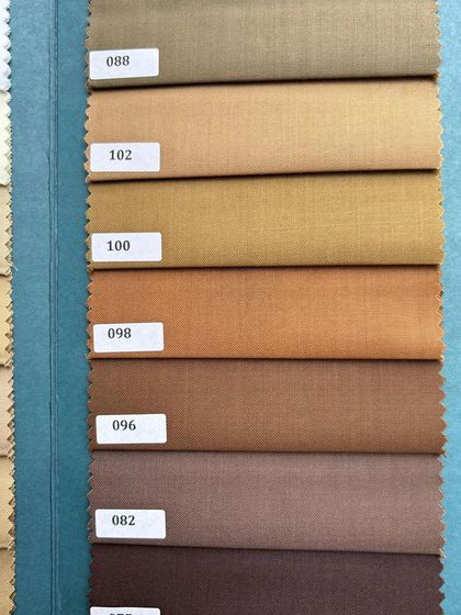 Our extensive range of brown and camel fabrics, perfect for crafting elegant and timeless menswear.
