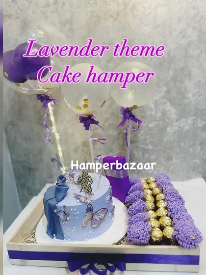 Our lavender theme cake hamper is a complete celebration in a tray. It includes a custom cake, Ferrero Rocher chocolates, fresh flowers, and balloon decorations.