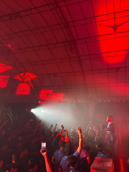 The venue was washed in red light as the crowd put their hands up. Creating these visually stunning and high-energy moments is what my live show is all about.