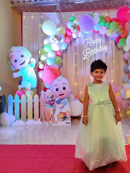 A young guest enjoying the Cocomelon themed stage. Our setups are designed to be interactive and fun for all the kids attending the party.