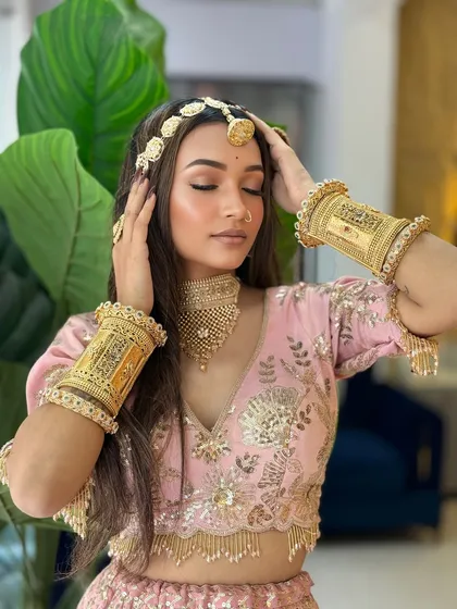 Another pose from the same series, showing the beautiful matha patti and the soft, glowing makeup.