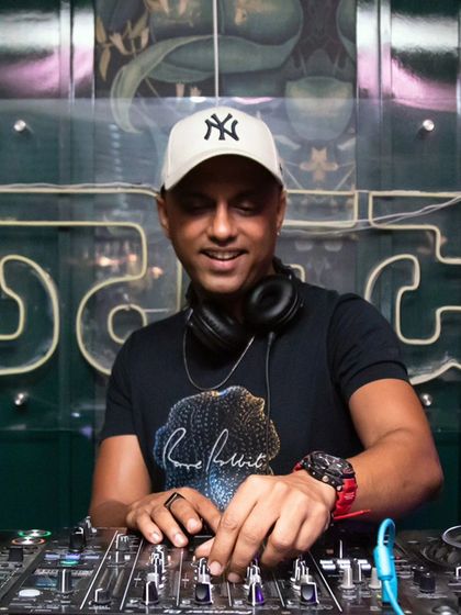 A close-up shot of me at the decks at Sarjapur Social. I love getting up close with the crowd and feeling the energy of the room as I mix.