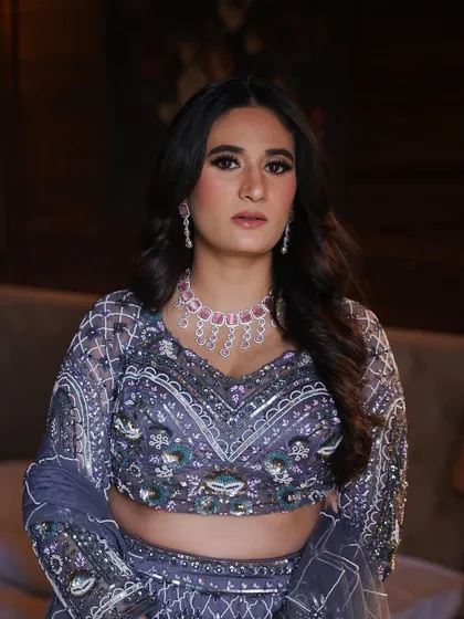 A final, powerful portrait. The makeup is bold and confident, just like the bride herself.