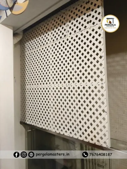 A clean, white lattice screen we installed to enclose a utility or balcony area. The diamond pattern provides effective visual screening and ventilation, offering a practical and aesthetically pleasing privacy solution.