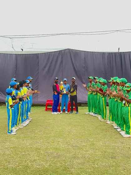 The champions being applauded by the runners-up.