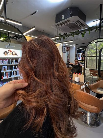 A stylist's-eye view, showing the detail and blend of the reddish-brown highlights.