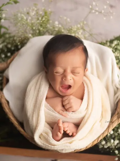 Sometimes the most precious moments are the unplanned ones. A tiny, sleepy yawn tells a story all on its own, and I am always ready to capture these fleeting, adorable expressions.