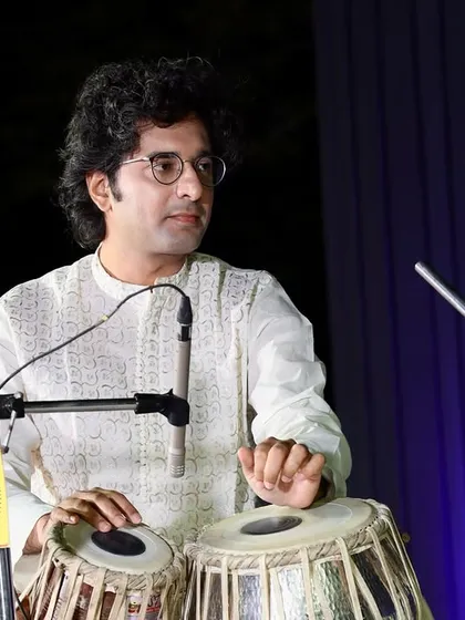 A close-up shot during a performance at SVNIT Surat. The focus required during a live classical concert is immense, but it is also a meditative experience.