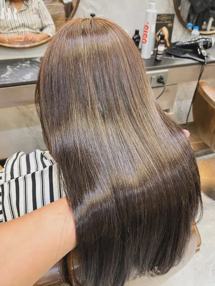This is the magic of our Hair Botox treatment. We take hair that's tired from daily styling and transform it into this incredibly smooth, glossy, and healthy-looking mane. It's the perfect foundation for any bridal hairstyle.