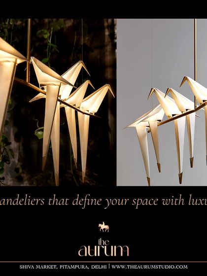 An artistic chandelier featuring origami-style birds perched on a branch. This is a whimsical yet sophisticated piece that I love for its ability to bring a story and a touch of nature-inspired art to a room.