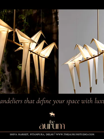 An artistic chandelier featuring origami-style birds perched on a branch. This is a whimsical yet sophisticated piece that I love for its ability to bring a story and a touch of nature-inspired art to a room.