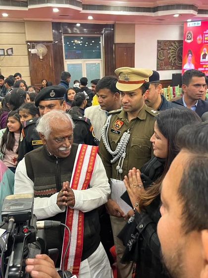 A moment of respect with the Hon'ble Governor Sh. Bandaru Dattatreya ji at a women's summit.