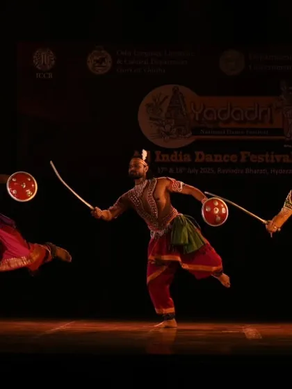Three of my dancers executing a coordinated attack sequence in a Mayurbhanj Chhau performance. The use of real swords and shields is integral to the authenticity of this martial dance.