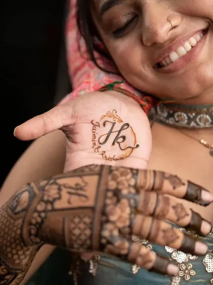 It's all in the details. We love adding personal touches like the couple's initials in a beautiful monogram, making your bridal henna a true reflection of your union. This is a small part of a full, intricate design.