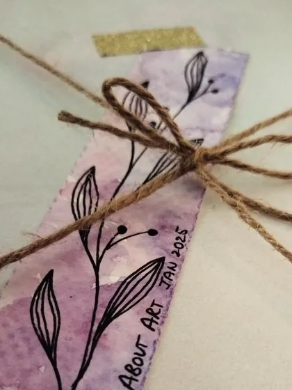 Even the smallest details are made with love. A hand-painted watercolor bookmark, tied with jute string, ready to be sent out with a larger order.