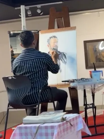 A view from behind as I work on a self-portrait demonstration for Hina Bhatt Art Ventures.