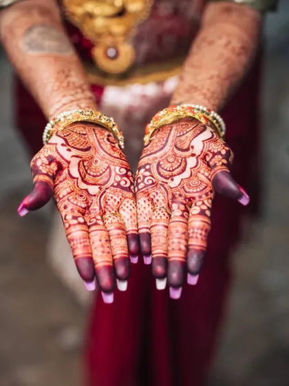 The result of my all-natural henna paste is this stunning, deep maroon stain. I am very particular about using high-quality ingredients to ensure a rich and long-lasting color for your special day.